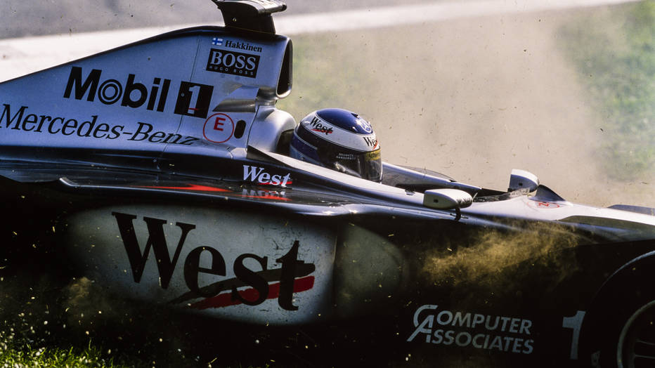 1999 Italian Grand Prix. Monza, Italy. 10th - 12th September 1999. Mika Hakkinen (McLaren MP4/14-Mercedes), retired action. World Copyright: LAT Photographic. Ref: 99ITA