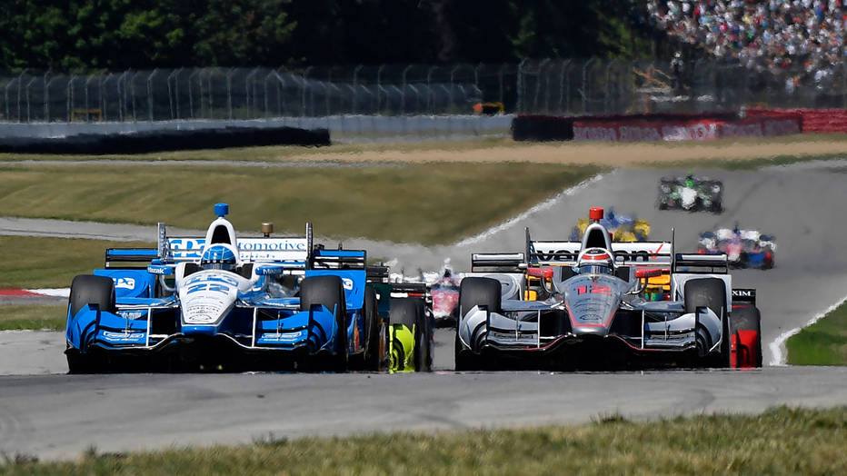 Pagenaud and team mate Power battle it out